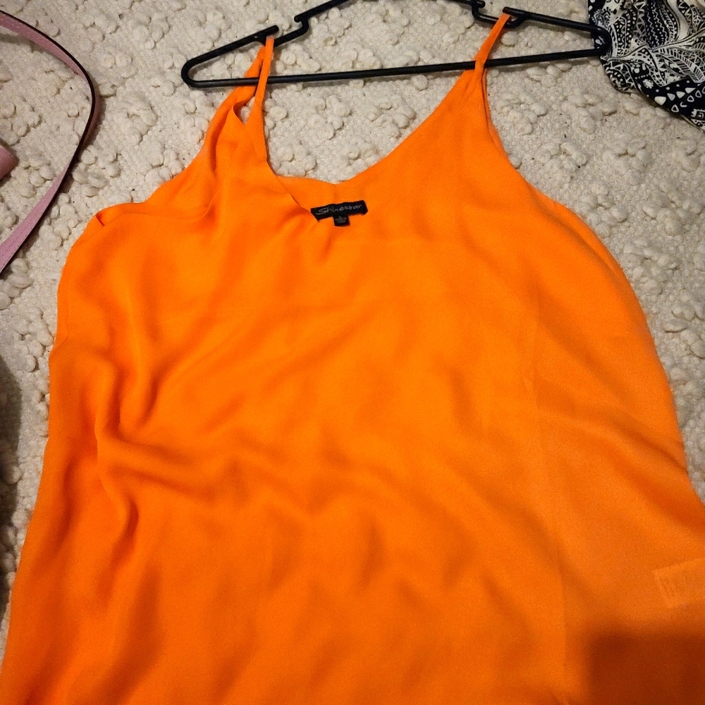 Satin orange spaghetti strapped shirt